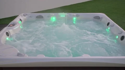 Close-up of the surface of a modern hot tub for relaxation therapy and Vidéo 172575900