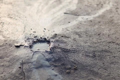 Close-up with the surface of mud volcano Stock Photos