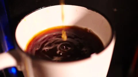Close up on the surface of a mug of hot coffee Stock Footage 153663959