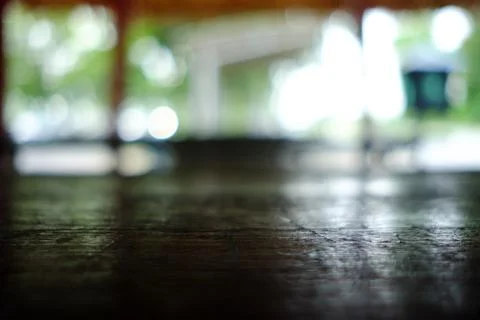 Close up Surface of Old Wooden Table in Cafe with Bokeh Background. Stock Photos