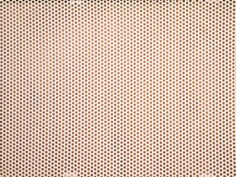 Close-up, surface of perforated metal sheet. Stock Photos