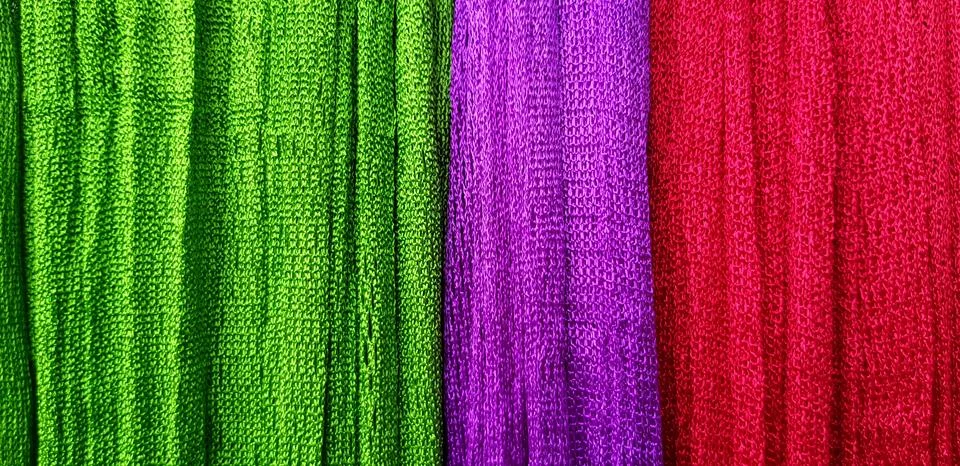 Close up surface of red, purple or violet and red fabric or cotton background Stock Photos