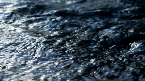 Close up for surface of the river stream flowing Vídeo Stock 124077393