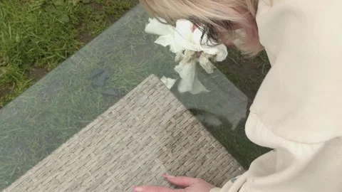 Close-up, Surface Sanitation, Spring Cleaning Routines, Garden Table Hygiene 動画素材 337786141
