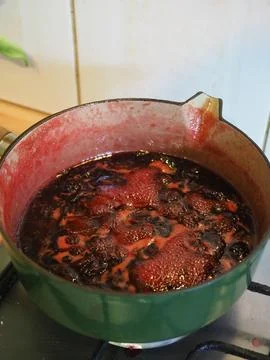 A close-up of the surface of some boiling fruit being used to make jam Stock Photos