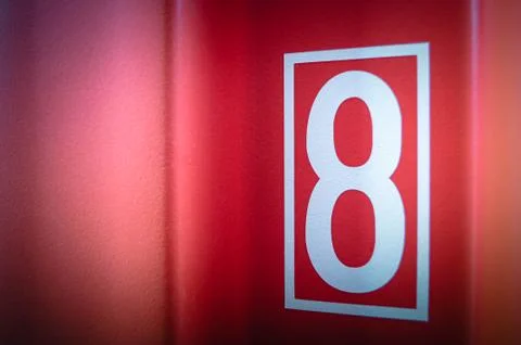 Close up surface texture of the Red container with eight number. Vintage back Stock Photos