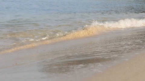 Close up surface of water sea wave on sand beach Stock Footage 108425620