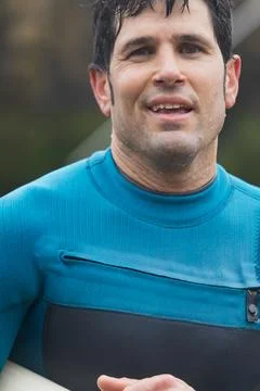 Close-up of a surfer looking determined, copy space. Stock Photos