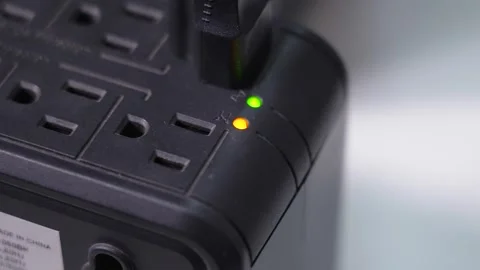Close-Up of Surge Protector with Indicator Lights Green and Yellow 動画素材 286006157
