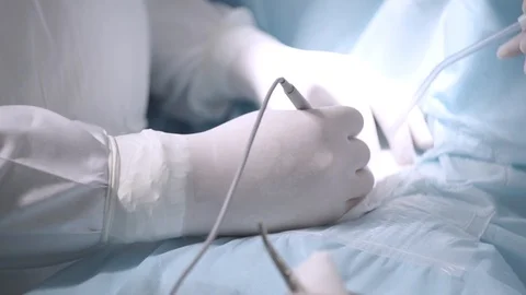Close-up of surgeon's hands during operation Stock Footage 101478433