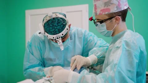 Close up of surgery team operating Stock Footage 135604892