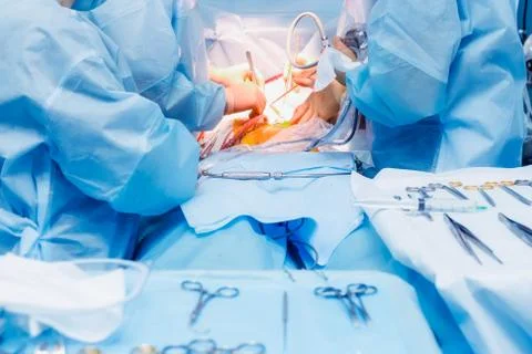 Close up surgical operation using laparoscopic equipment in modern clinic Stock Photos