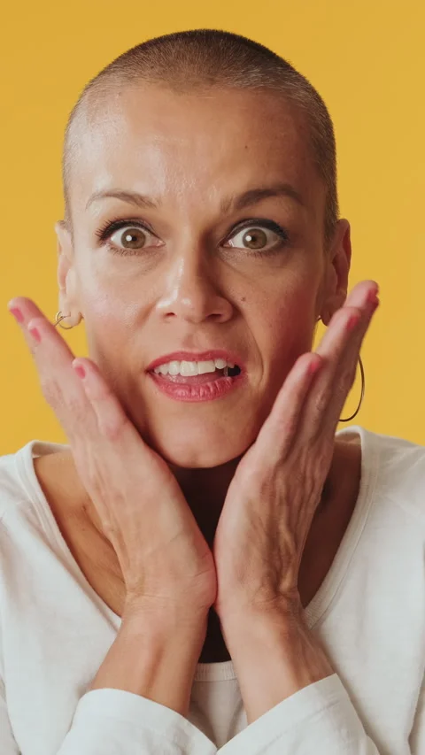 Close-up, surprised woman looking at camera with big eyes, says wow, isolated on Stock Footage 254962583