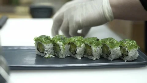 Close up of sushi chef hands preparing japanese food. Stock Footage 237391209