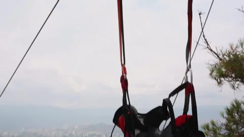 Close-up of suspended gear for the zip line with carabiners, ropes, fasteners Stock Footage 248528949