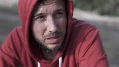 Close-up of a sweaty man's face after jogging. Stock Footage 314653803