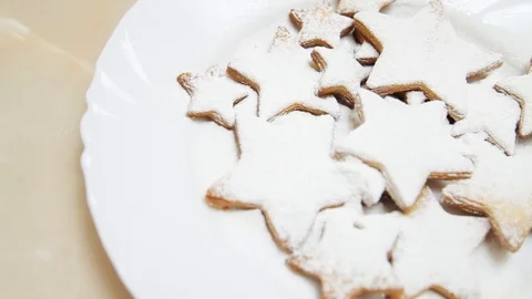 Close up sweet biscuits cookies lying on a plate tasty delicious sugar biscuits Stock Footage 99372832