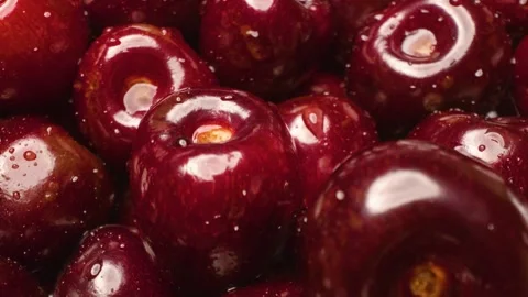 Close-up of sweet cherries  captured with a sliding motion. Stock Footage 313802260