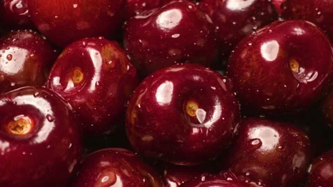 Close-up of sweet cherries  captured with a sliding motion. Stock Footage 313802311