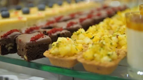 Close-up of sweet dishes on the buffet table in a restaurant. Buffet food. Stock Footage 269933130