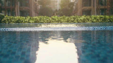 Close up swimming pool with blurred resort background. Stock Footage 155428722