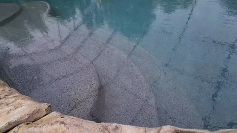 Close Up Swimming Pool With Rain Drops Falling On Water, 4K Video stock 248257900