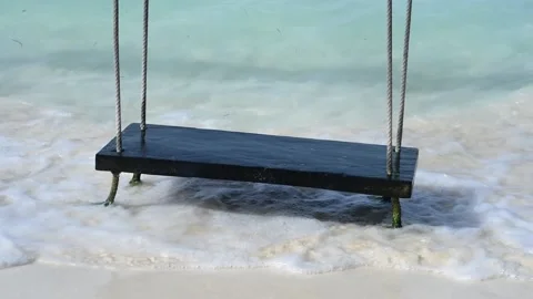 Close-up of a swing over water Stock Footage 203755724