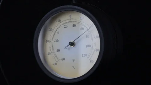 Close-up of swinging pendulum barometer with focus transfer Stock Footage 89028521