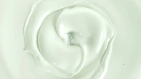 Close-up of swirling milk Vídeos de archivo 46634411