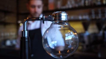 Close up of Syphon coffee maker barista in a background Video stock 85616280