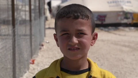 Close up for Syrian boy in Zaatari camp in Jordan Stock Footage 73728576