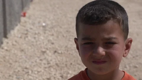 Close up for Syrian boy in Zaatari camp Stock Footage 73728605