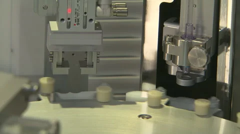 Close up of syringe filling machine Stock Footage 50627071