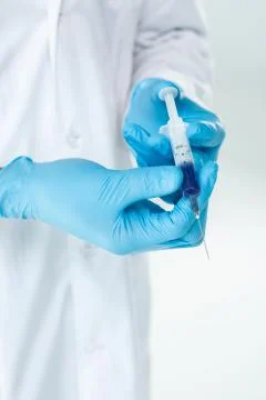 Close up of a syringe before injection Stock Photos