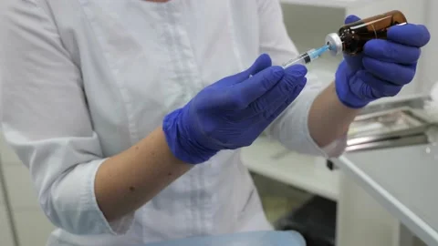 Close up of syringe to prepare for medic injection in cosmetology clinic. Video stock 142230146