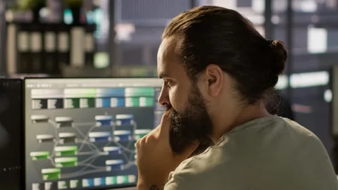 Close up of system administrator transforming data into predictive models Stock Footage 318238518