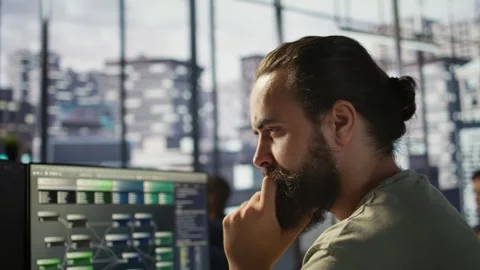 Close up of system administrator transforming data into predictive models Stock Footage 318239499