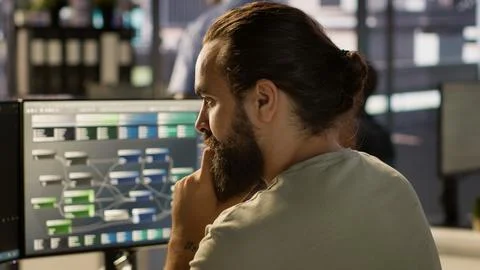 Close up of system administrator transforming data into predictive models Stock-Fotos