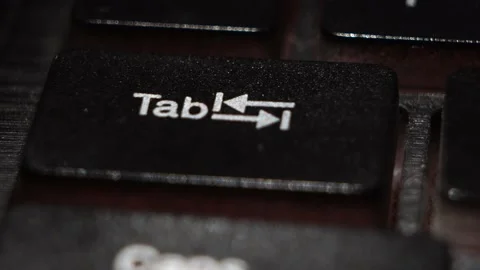 Close-up TAB button macro shooting the led light on the keyboard Stock Footage 130211132
