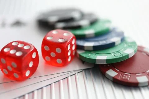 Close up on table are dice chips playing cards Stock Photos