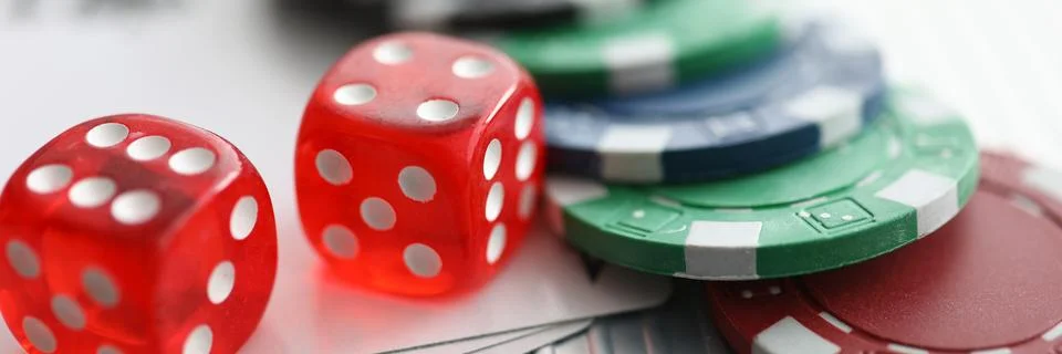 Close up on table are dice chips playing cards 写真素材
