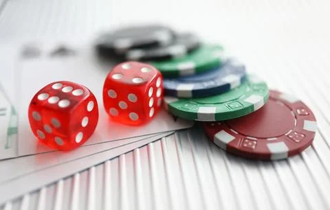 Close up on table are dice chips playing cards Stock Photos
