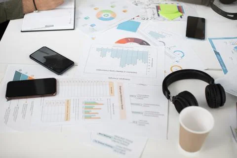 Close up of table with documents and modern gadgets 스톡 사진