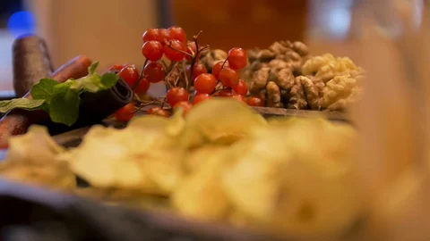 Close up of the table with dried slices of apples, red cranberries, mint leaves Stock-Footage 130068778