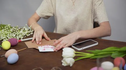 Close-up on a table with items to create a composition for Easter. Happy Easter Stock Photos