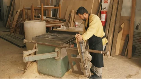 Close Up of Table Saw Cutting Wood on Construction Site Stock Footage 167708338