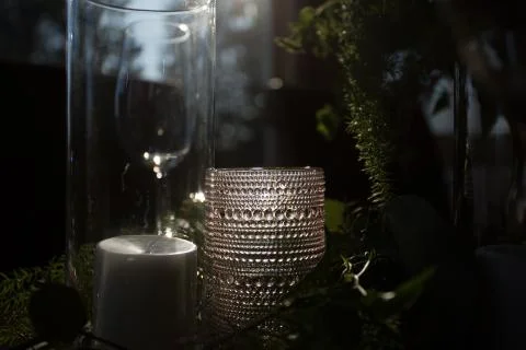 Close up of a table set decorated with candles. Stock Photos