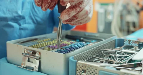 Close up of table with sterilization containers with sterilized tools and Stock Footage 140166695