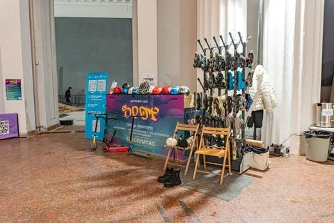 Close-up of a table with various objects possibly helmet, bookspamphlets in.. Stock Photos
