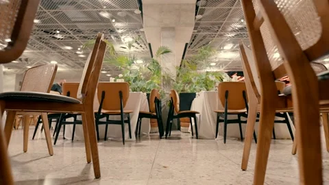 Close-up of tables and chairs ready to receive guests Видео 226745383